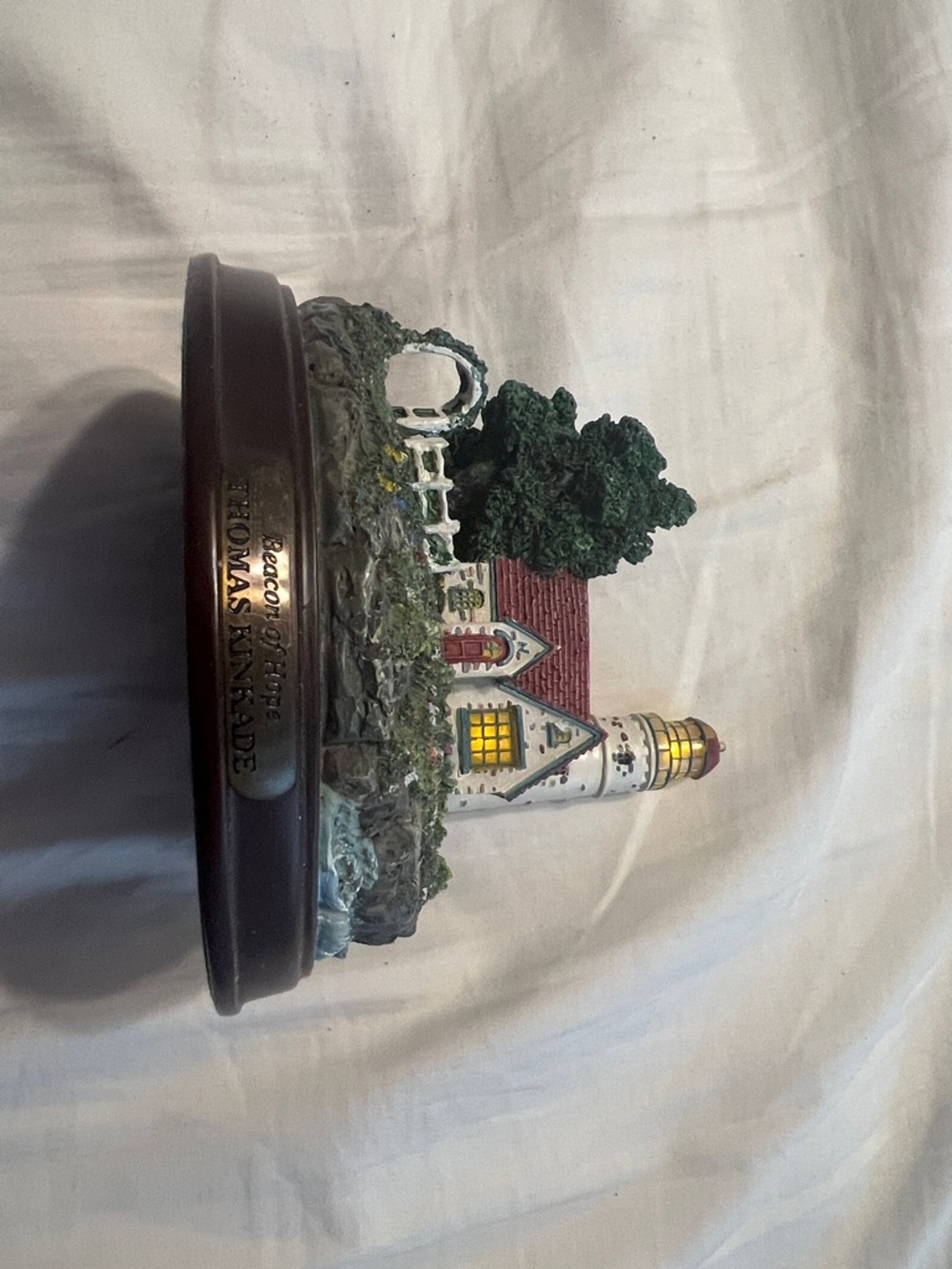 1999 Thomas Kinkade White Lighthouse Figurine with Red Roof and Green Trees